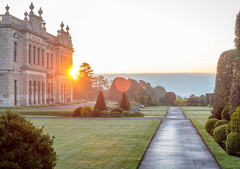 BRODSWORTH_HALL_YORKSHIRE_THE_HALL_AT_DAWN_SUMMER_PATHS_LAWNS_CLIPPED_TOPIARY