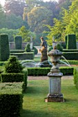 EN HOUSE, SOMERSET: EARLY MORNING MIST ON FORMAL PARTERRE, TERRACE, WATER FEATURE, FOUNTAIN, TOPIARY, FOCAL POINT, JUNE, SUMMER