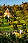 ROCKCLIFFE, GLOUCESTERSHIRE: AVENUE OF TOPIARY BIRDS LEADING TO DOVECOTE, GATE, STEPS, LAWN, GRASS, EVERGREENS, CLIPPED