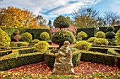 THENFORD GARDENS & ARBORETUM, NORTHAMPTONSHIRE: AUTUMN, OCTOBER, HEDGES, HEDGING, PINK, PERGOLA, ARCH, KNOT GARDEN, HOLLIES, ILEX, BOX, PATHS, CLIPPED, TOPIARY