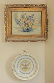 PEAR TREE COTTAGE, OXFORDSHIRE: SITTING ROOM, FRENCH VINTAGE FLORAL PAINTING AND DECORATIVE CERAMIC PAINTED PLATE