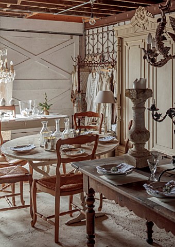 CEST_TOUT_INTERIORS_THE_BARN_SHOP__ASSORTED_VINTAGE_FRENCH_TABLES_CHAIRS_CHANDELIERS