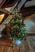 THE HYDE, HEREFORDSHIRE: JANUARY, CHRISTMAS TREE IN BEDROOM BY SHANE CONNOLLY