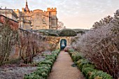 ROUSHAM, OXFORDSHIRE: JANUARY, FROST, FROSTY, WINTER, PATH THROUGH THE WALLED GARDEN, BORDERS, GATE