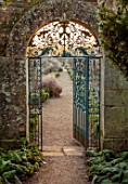 ROUSHAM, OXFORDSHIRE: JANUARY, FROST, FROSTY, WINTER, DAWN, SUNRISE, THE WALLED GARDEN, METAL GATE