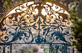 ROUSHAM, OXFORDSHIRE: JANUARY, FROST, FROSTY, WINTER, DAWN, SUNRISE, THE WALLED GARDEN, DETAIL OF METAL GATE
