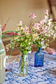 HAM COURT, OXFORDSHIRE: WILLOW CROSSLEY WORKHOP - FLOWERS IN GLASS BOTTLES, VASES ON TABLE
