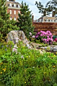 CHELSEA 2022: A SWISS SANCTUARY BY LILLY GOMM: ROCKS, WATERFALL, RHODODENDRON, FENCE, FENCING