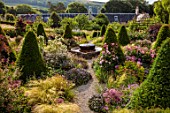 ENCOMBE HOUSE, DORSET: WALLED GARDEN, YEW TOPIARY, ALLIUM CHRISTOPHII, STIPA TENUISSIMA, FOUNTAIN, PATHS, ROSE MARY ROSE, ROSE FELICIA, SAGE