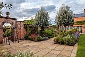 MORTON HALL GARDENS, WORCESTERSHIRE: THE SOUTH GARDEN, BORDERS, LAWN, SEPTEMBER, COSMOS, CLEOME, ECHINACEA, PATHS, WALLED GARDEN, GATE
