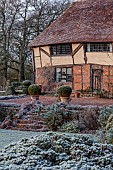 LONG BARN GARDENS, KENT: FROST, WINTER, HOUSE, STEPS, TERRACE, TERRACOTTA CONTAINERS