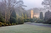 BRODSWORTH HALL, YORKSHIRE: WINTER, JANUARY, FROST, VICTORIAN, MIST, FOG, HEDGES, HEDGING, LAWN, CHURCH