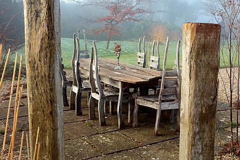 LONGYARD_COTTAGE_ESSEX_WINTER_FEBRUARY_MIST_FOG_FOGGY_WOODEN_TABLE_AND_CHAIRS_ON_PATIO