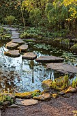 MORTON HALL GARDENS, WORCESTERSHIRE: THE STROLL GARDEN, APRIL, WATER, POOL, POND, STEPPING STONES, SPRING