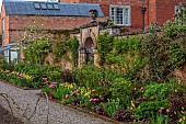 MORTON HALL GARDENS, WORCESTERSHIRE: MAY, SPRING, KITCHEN GARDEN, BORDERS, TULIPS, WALLS, WALLED