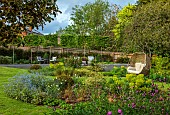 DESIGNER JAMES SCOTT, THE GARDEN COMPANY: SMALL, FORMAL, TOWN, GARDEN, SWIMMING POOL, LAWN, STEPS, SEATING, BORDERS, EUPHORBIA, FENCE, FENCING, RED CAMPION, SILENE DIOICA