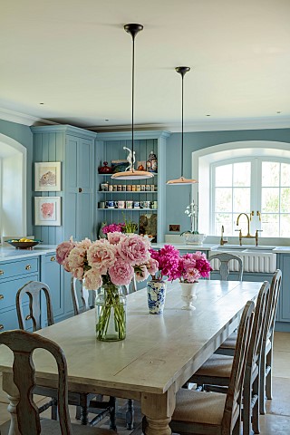 PRIVATE_GARDEN_DEDHAM_VALE_SUFFOLK_KITCHEN_TABLE_REPRODUCTION_OF_A_FRENCH_MONASTERY_TABLE_PEONIES_KI
