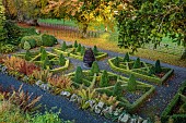 HERGEST CROFT GARDENS, HEREFORDSHIRE: THE SLATE GARDEN, FORMAL, KNOT GARDEN, CLIPPED TOPIARY BOX, BUXUS AND LONICERA NITIDA, SLATE SCULPTURE, AUTUMN COLOURS, NOVEMBER, FALL, AUTUMN