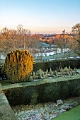 BECKLEY PARK, OXFORDSHIRE: FROST, FROSTY, WINTER, HOUSE, CLIPPED TOPIARY, HEDGES, HEDGING, BOX, BORROWED LANDSCAPE