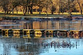 BECKLEY PARK, OXFORDSHIRE: FROST, FROSTY, WINTER, LAKE, WATER, STEPPING STONES MADE FROM ROBERT ADAM PLINTHS