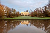 HORKESLEY HALL, ESSEX: WINTER, FEBRUARY, DAWN LIGHT, MORNING LIGHT, LAWN, LAKE, HOUSE, REFLECTED, REFLECTIONS