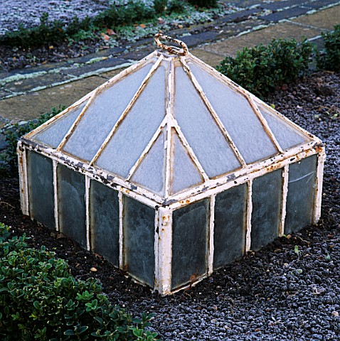 A_VICTORIAN_GLASS_CLOCHE_IN_THE_POTAGER_AT_BARNSLEY_HOUSE__GLOUCESTERSHIRE