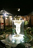 FOUNTAIN WITH LIGHTING BY GARDEN & SECURITY LIGHTING. DESIGN BY NATURAL & ORIENTAL WATER GARDENS