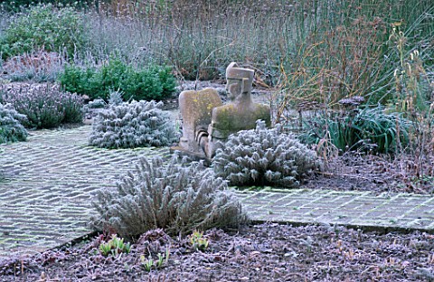 THE_HOT_GARDEN_WITH_SCULPTURE_OF_CHAC_MOOL_RAIN_GOD_BY_HELEN_SINCLAIR__ARROW_COTTAGE__HEREFORDSHIRE
