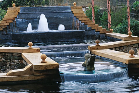 WATER_FEATURE_FOUNTAIN_LEADING_TO_A_PETER_BARKER_SCULPTURE_PARTING_THE_WATERS_INTO_THE_STEW_POND_THE