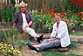 JUDY PEARCE AND MARY PAYNE PHOTOGRAPHED IN THE PRAIRIE SECTION OF THE GARDEN AT LADY FARM