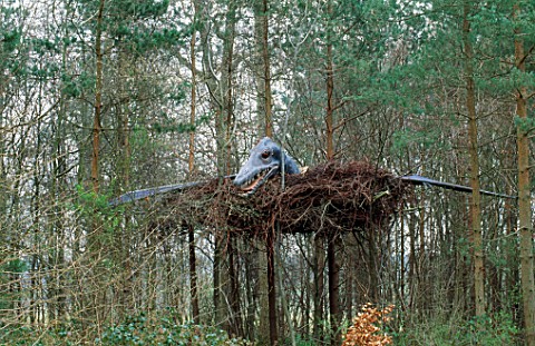 LARGE_MAN_MADE_DINOSAUR_NEST_IN_THE_TREES_WITH_PTERODACTYL_DESIGNED_BY_IVAN_HICKS_GROOMBRIDGE_PLACE_