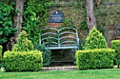 METAL BENCH AND BOX TOPIARY SHAPES. LORD LEYCESTER HOSPITAL GARDEN  WARWICK