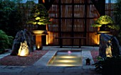 JAPANESE STYLE GARDEN: POND  ROCKS LIT FROM BELOW  PINUS BONSAI & BAMBOO FENCE. THE ZEN INSPIRED GDN. DES: SPIDERGARDEN.COM  LIGHTING: COTSWOLD ELECTRICAL. CHELSEA 2000