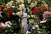 CAROLYN HUBBLES GARDEN  SHROPSHIRE: THE VALENTINE GARDEN WITH ITALIAN MARBLE STATUE AND ROSES