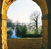 VIEW OF THE RIVER CHERWELL FROM THE 7 ARCHED PORTICO CALLED PRAENESTE  ROUSHAM LANDSCAPE GARDEN  OXFORDSHIRE