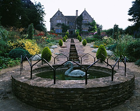 VIEW_FROM_THE_BOTTOM_OF_THE_RILL_GARDEN_WITH_EASTLEACH_HOUSE_IN_THE_BACKGROUND