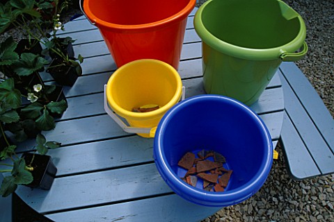 COLOURFUL_SEASIDE_BUCKETS_WITH_CROCS_AT_THE_BOTTOM