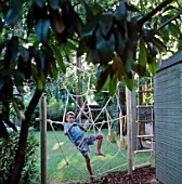 SPIDERS WEB ROPE CLIMBING FRAME: STEVEN JAMES CLIMBING ON THE WEB