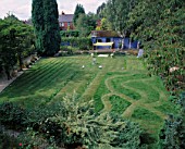 CHILDRENS SUMMER PARTY: THE LAWN PREPARED FOR PARTY WITH RUNNING TRACK   SILVER BIRD BATH  GRASS MAZE AND BOULES AREA