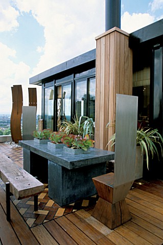 AFRICAN_THEMED_ROOF_TERRACE_SLIDING_SKYLIGHT_WITH_PERIMETER_GALVANISED_CONTAINERS__IROKO_DECKING___D