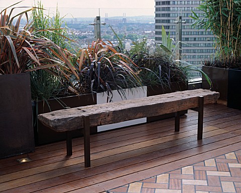 AFRICAN_THEMED_ROOF_TERRACE_A_PLACE_TO_SIT_RAILWAY_SLEEPER_BENCH__GLASS_BALUSTRADE__POWDER_COATED_CO