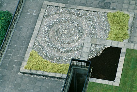 THE_DROP___A_HUGE_SPIRAL_WATER_DROPLET_MADE_FROM_100S_OF_PEBBLES_CEMENTED_BY_HAND__BY_TONY_HEYWOOD_O
