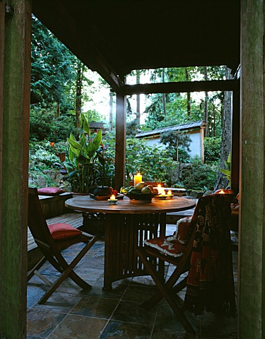 INSIDE_OF_THE_INDONESIAN_GAZEBO_WITH_TABLE_AND_CHAIRS_DESIGNERS_ILGA_JANSONS_AND_MIKE_DRYFOOS
