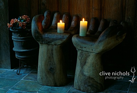 INSIDE_OF_THE_INDONESIAN_GAZEBO_WITH_WOODEN_HAND_CHAIRS_AND_CANDLES_DESIGNERS_ILGA_JANSONS_AND_MIKE_
