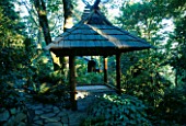 THE JAPANESE BELL TOWER IN THE WOODLAND. DESIGNERS: ILGA JANSONS AND MIKE DRYFOOS  SEATTLE  USA