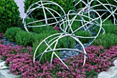 TATTON PARK 2002/ DESIGNER: MYFANWY JONES: PINK THYME WITH METAL GLOBES