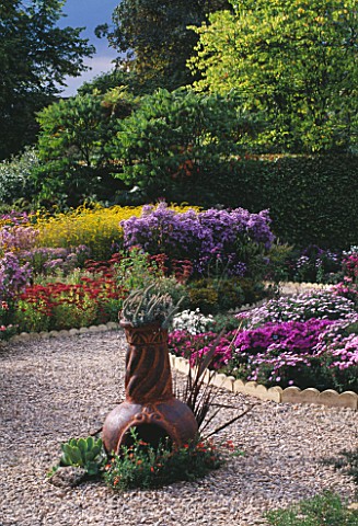 ASTERS_AT_THE_PICTON_GARDEN__WORCESTERSHIRE__WITH_SEDUM_AUTUMN_JOY_AND_SOLIDAGO_FIREWORKS