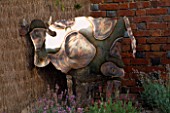 DOWNDERRY NURSERY  KENT: METAL COW BY COLIN COMRIE