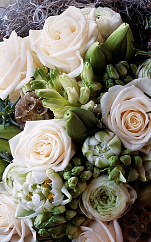 WHITE_AND_LIME_GREEN_BOUQUET_CONTAINING_WHITE_ROSES_AND_BUDDING_TULIPS_BY_THE_FLOWERBOX