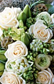 WHITE AND LIME GREEN BOUQUET CONTAINING WHITE ROSES AND BUDDING TULIPS BY THE FLOWERBOX